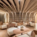 含有大樹建築寓意的【新業(yè)觀峰】，圖書會議室也根據大樹枝枒的樣貌，板翼自上方天花板延伸至左右書櫃作為隔間，打造流暢的流線感，彷彿棲息於樹屋，享受靜謐的閱讀時光。